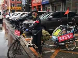 秦皇岛二手面包汽车(湖南父亲带4岁儿子骑行8个多月，行程超5千公里沿途宣传禁毒)
