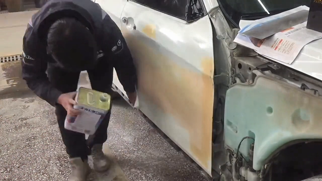 宝马事故车的干磨工艺与中涂底漆喷涂，效果如何？