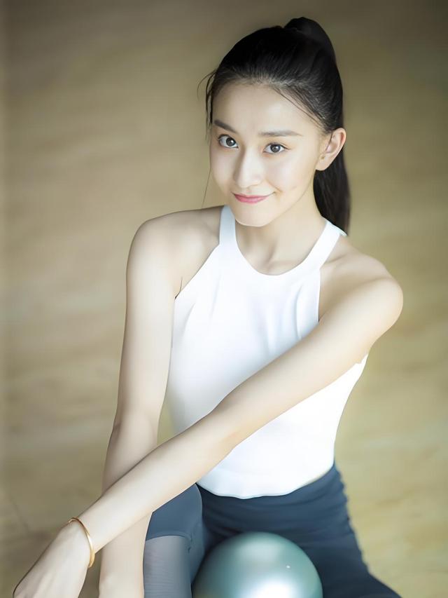 体操女神张豆豆:“挺胸照” 出圈,嫁孙杨的逆袭爱情与事业